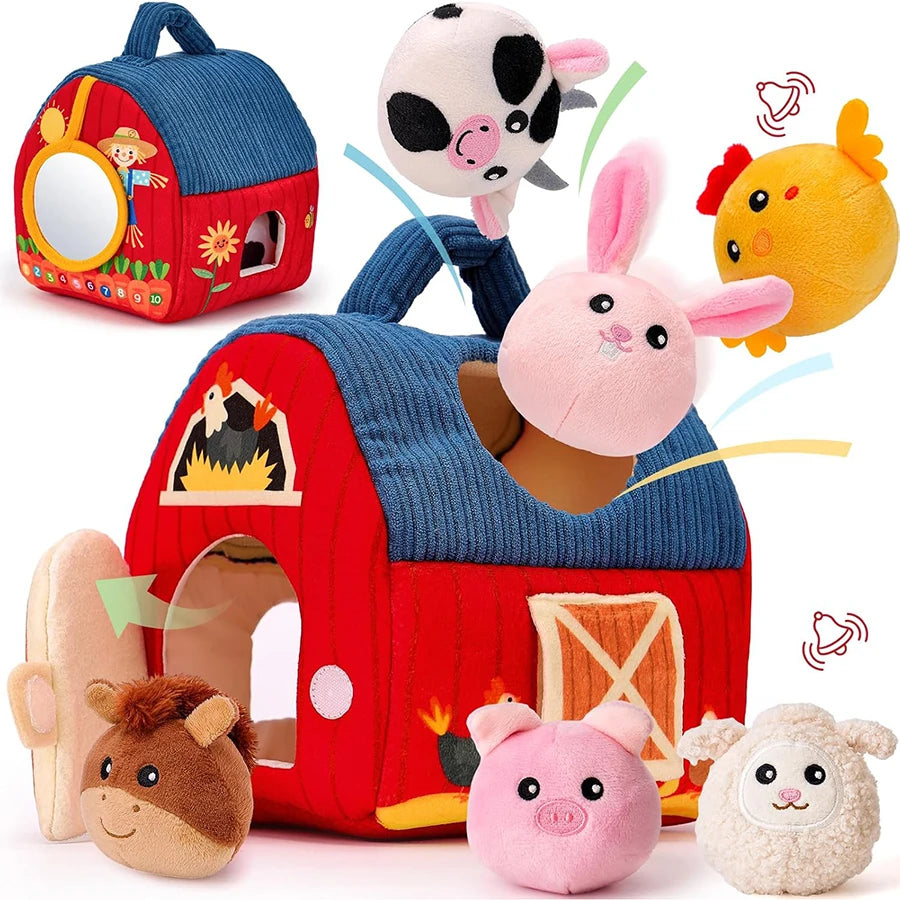 Children's farm toy set with plush animals and barn structure on a white background