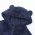 Navy blue fluffy hooded outfit on a white background