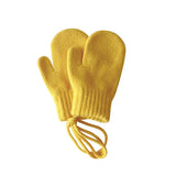 Pair of yellow mittens with a drawstring on a white background