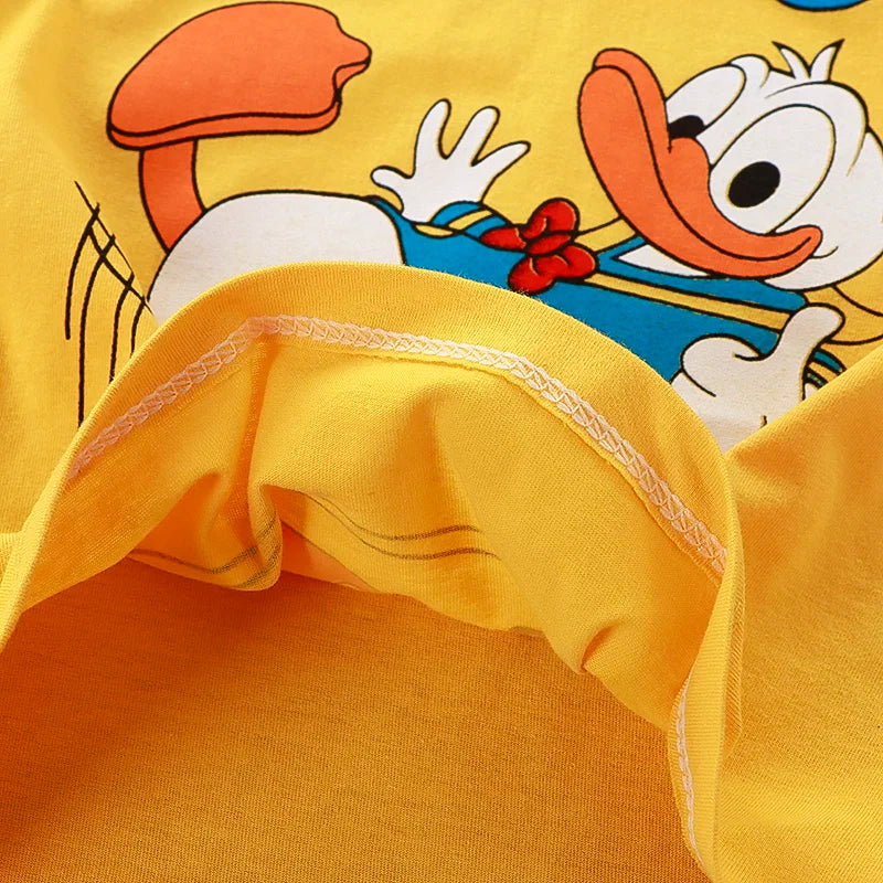 Close-up of a yellow garment with cartoon character design