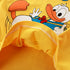 Close-up of a yellow garment with cartoon character design