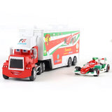 Toy truck and car set with racing theme on a white background