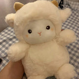 Plush toy resembling a cat with a checkered background