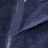 Close-up of a navy blue fleece jacket zipper