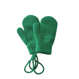 Pair of green knitted mittens on a white background
