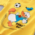Yellow t-shirt with cartoon character playing soccer on a yellow background