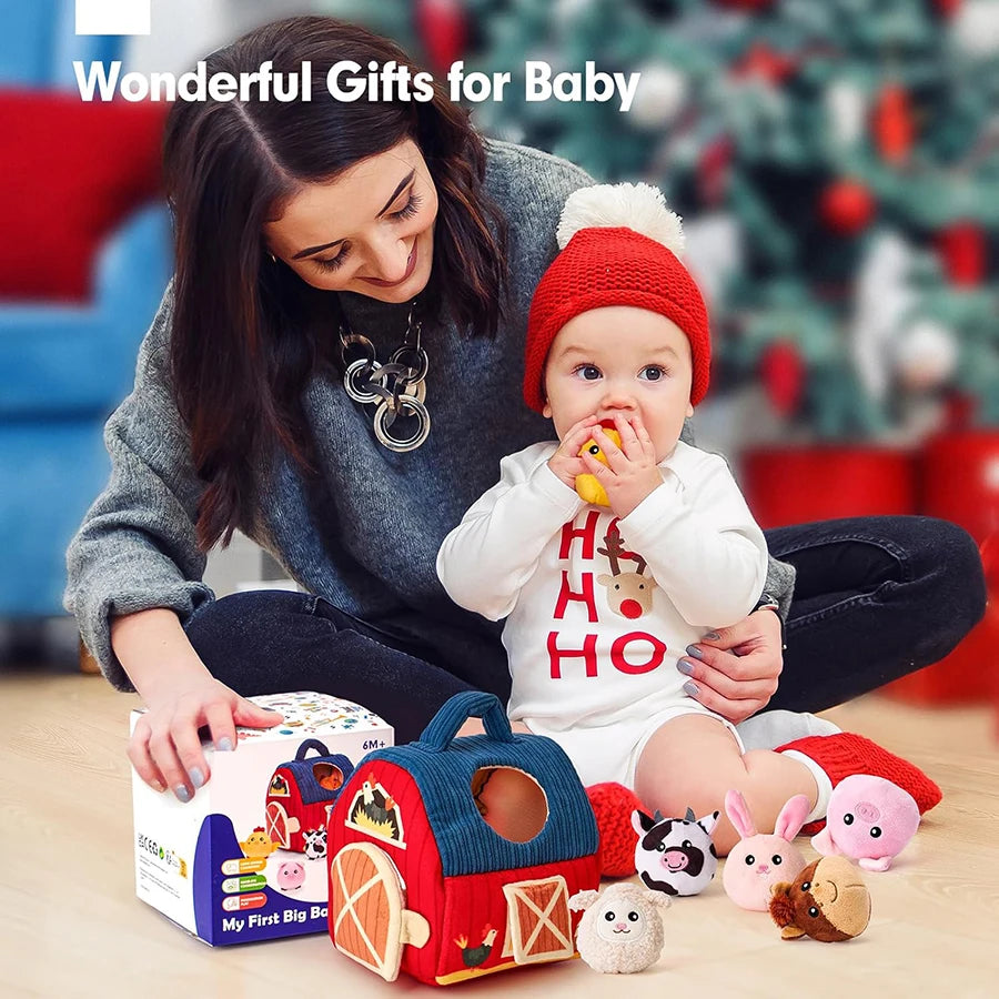 Woman and baby playing with toys in a festive setting