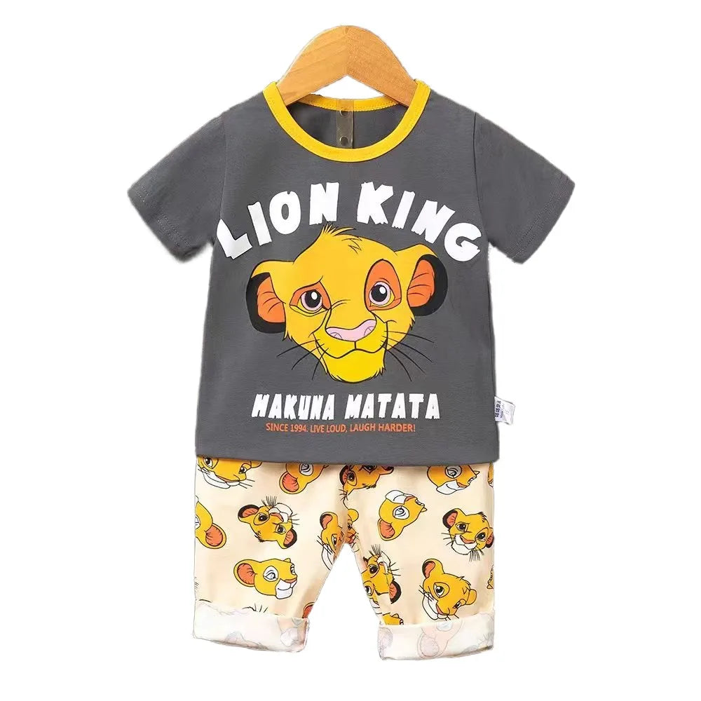 Children's outfit with 'Lion King' design on a hanger