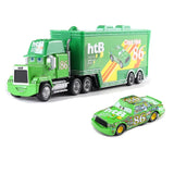 Green Toy truck and car set with a white background