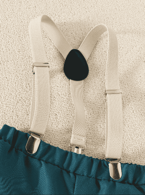 White suspenders on a textured beige background