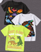 Three children's t-shirts with dinosaur graphics on a gray background
