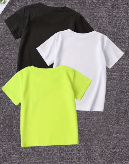 Three t-shirts in black, white, and green on a textured gray background