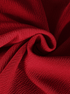 Close-up of red fabric with a textured pattern