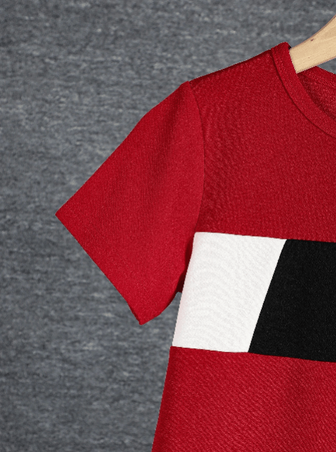Red sweater with geometric pattern on a gray background