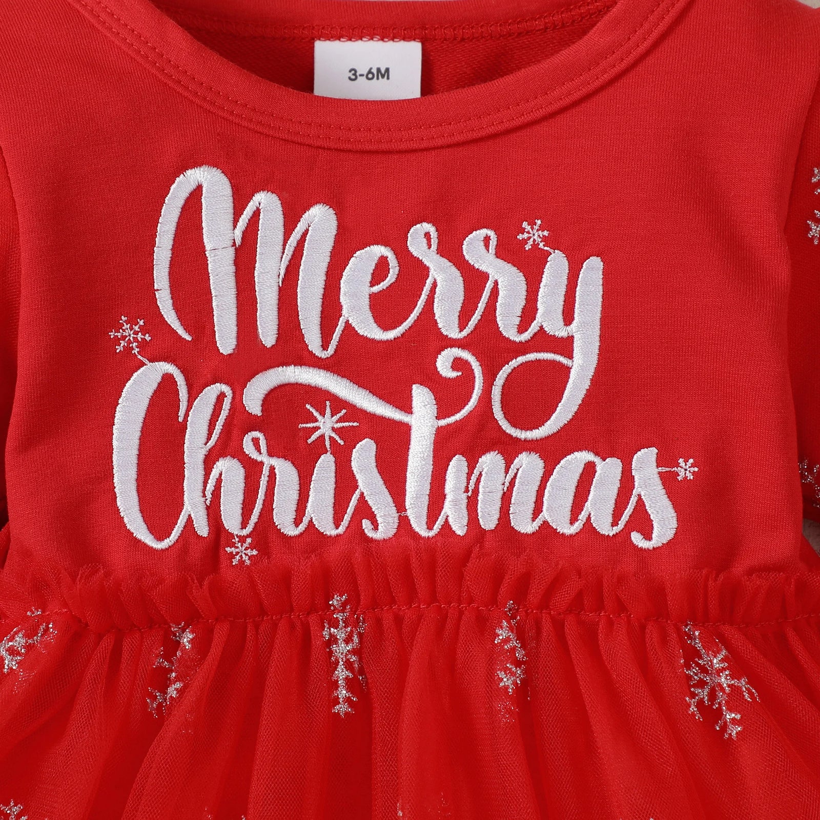 Red dress with 'Merry Christmas' text and snowflake details, suitable for infants.