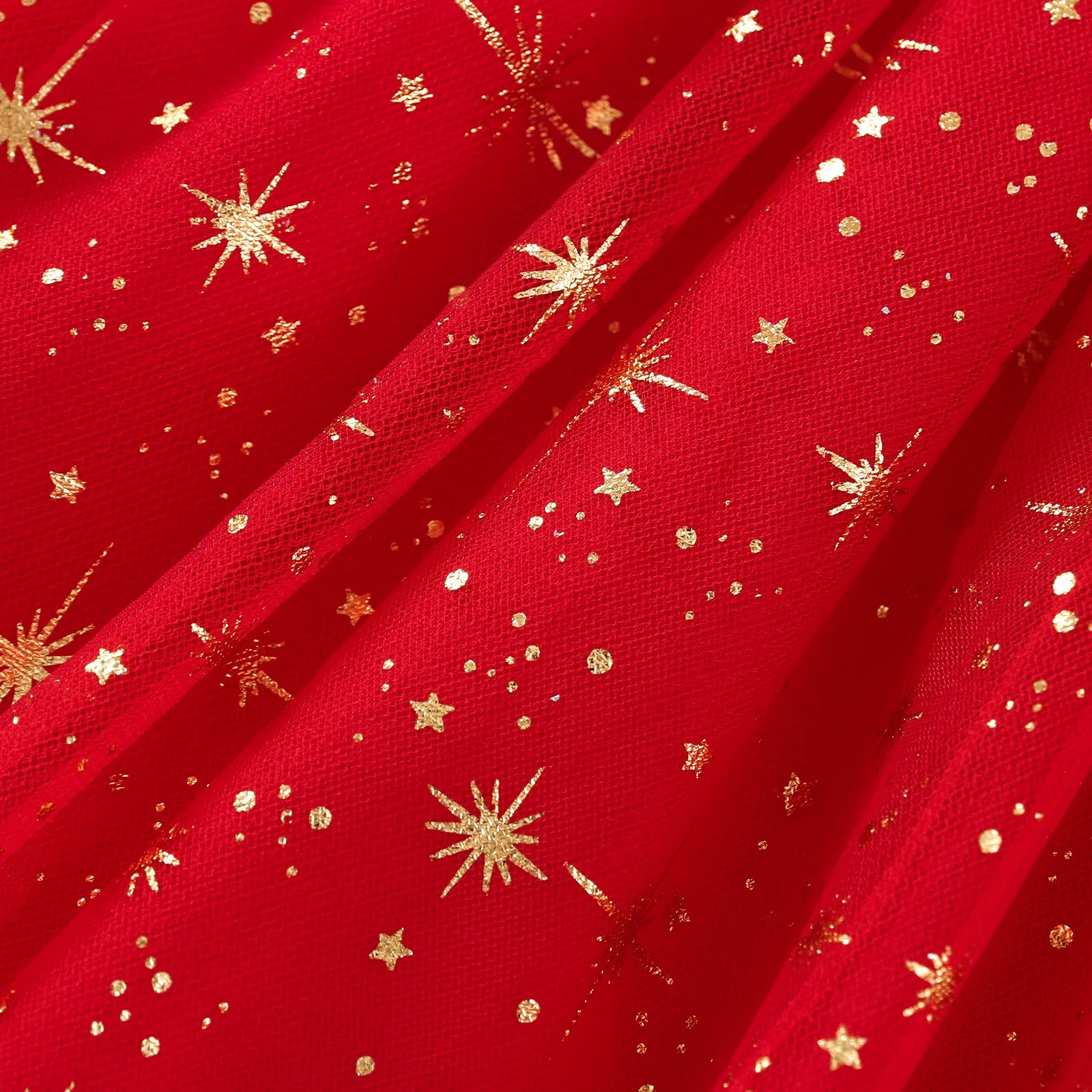 Red fabric with gold star patterns