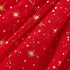 Red fabric with gold star patterns