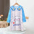 Children's dress with cartoon character on a hanger against a neutral background