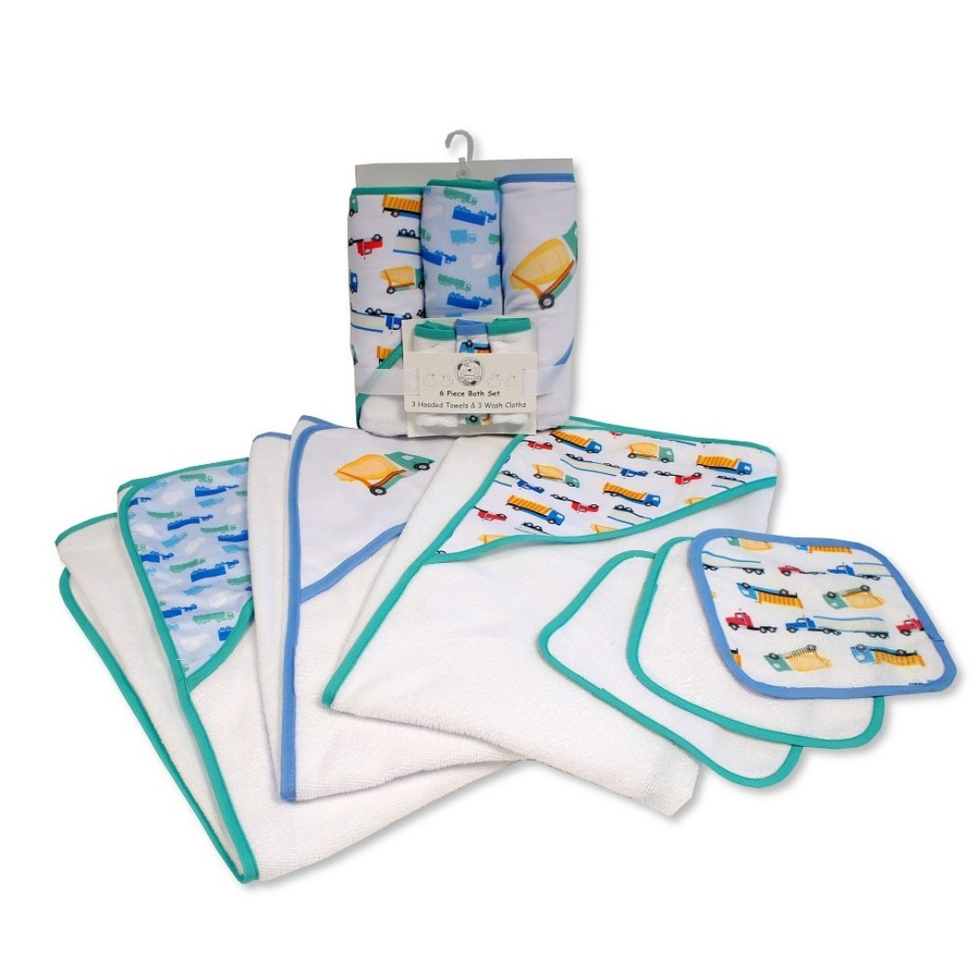 A baby towel set with white cotton cloths and hoodies featuring colorful construction vehicle prints and contrasting blue and teal borders, shown both folded and hanging in its packaging on a white background.