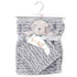 Gray chevron patterned blanket with a teddy bear plush toy on a hanger, branded 'Snuggle Tots'.