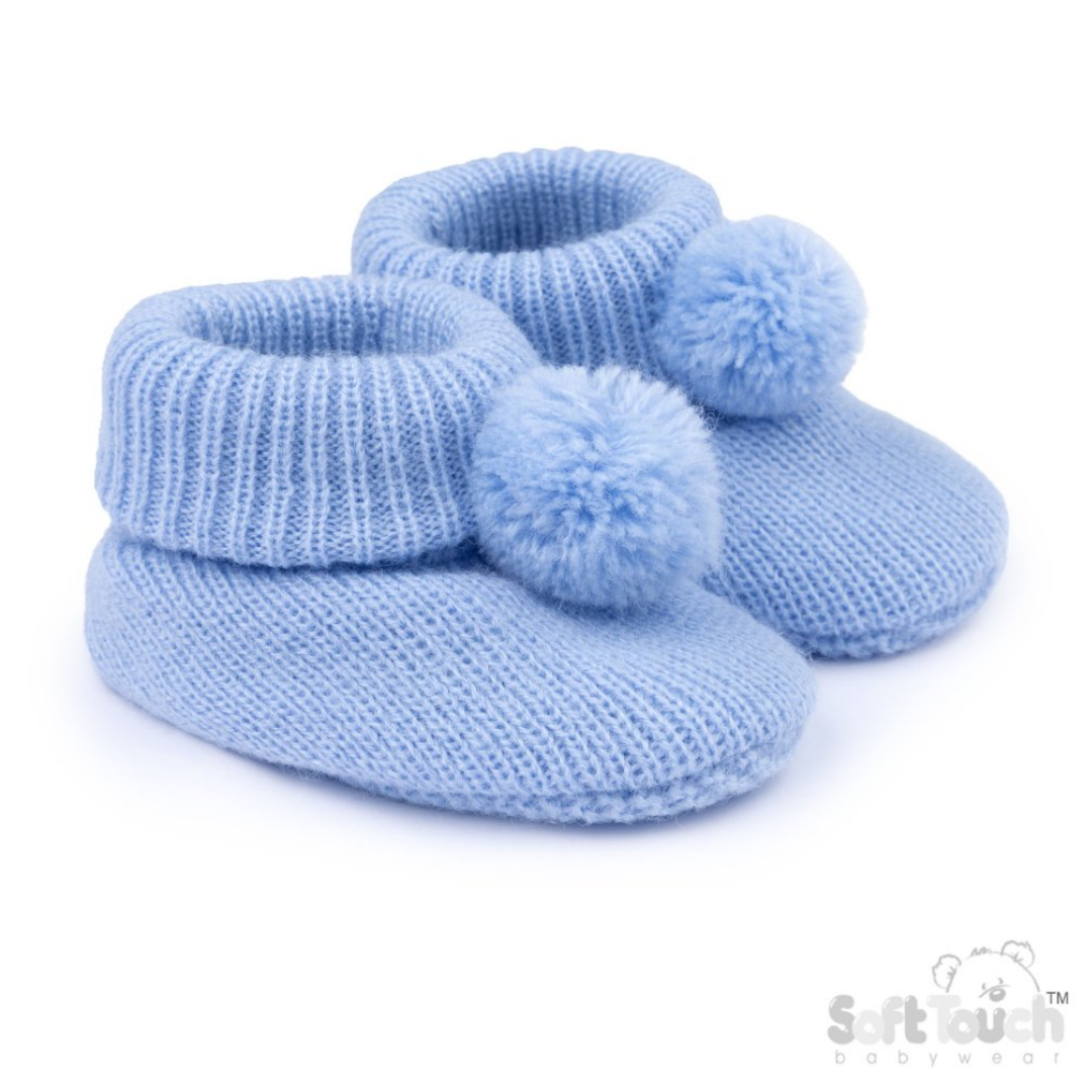 A pair of light blue knit baby booties with fluffy pom-poms, shown on a clean white background.