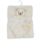 A cream-colored plush baby blanket with a teddy bear face and a matching ribbon bow, hanging on a white plastic hanger against a white background.