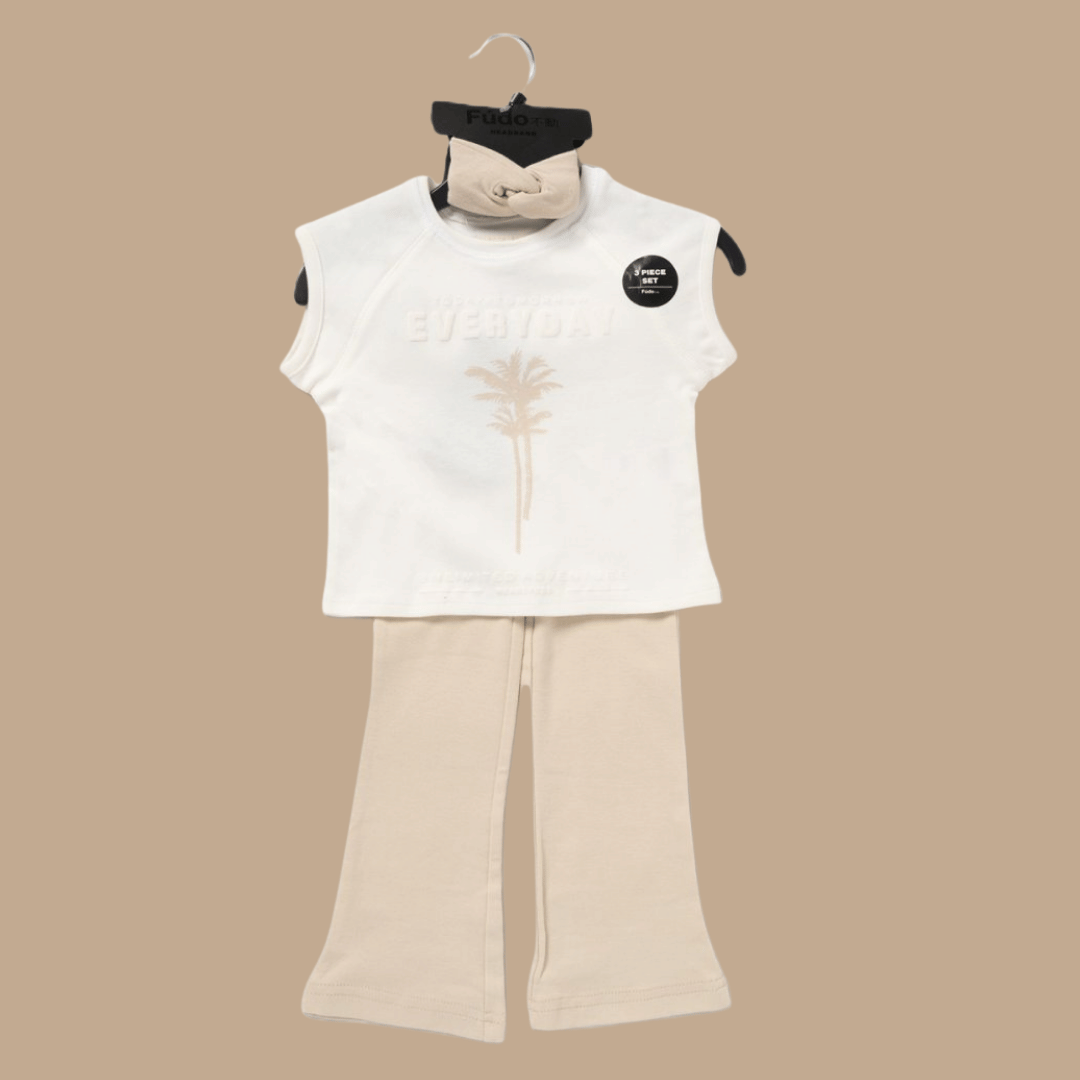 White sleeveless top and beige pants set on a hanger against a beige background