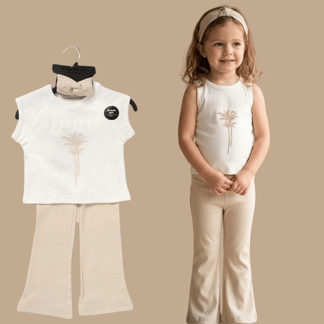 Child wearing a white sleeveless top and beige pants with a matching outfit on a hanger.