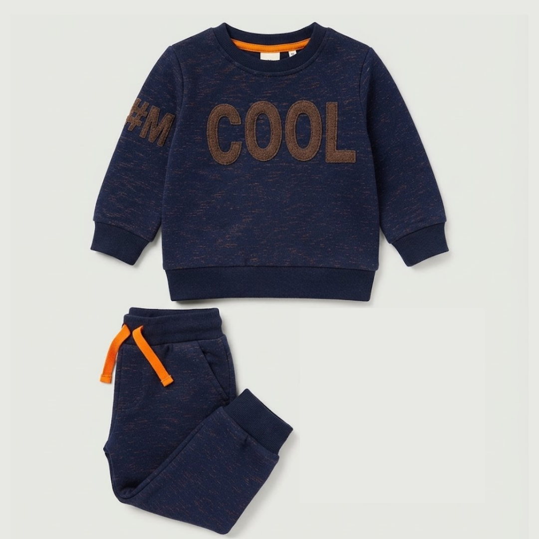 A two-piece kids' clothing set featuring a navy blue heathered sweatshirt with 'COOL' printed in brown across the chest and matching navy jogger pants with an orange drawstring, displayed on a light gray background.