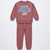 A two-piece kids' sweatshirt and jogger set in a dusty rose color, featuring a graphic print on the chest with the words 'Dusty Rose' in blue-gray bubble letters and smaller white text underneath, displayed on a clean white background.