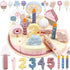 Toy birthday cake set with candles, numbers, and decorations on a white background