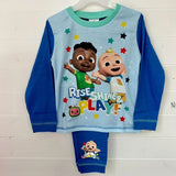 Children's pajama set with cartoon characters and 'Rise, Shine & Play!' text on a white background