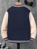 Navy and beige varsity jacket on a mannequin against a gray background