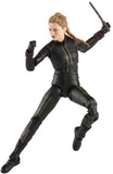 Action figure in black and gold costume on a white background