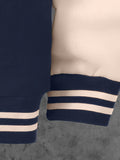 Navy blue socks with white stripes on a dark background