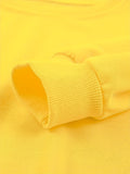 Close-up of a yellow fabric with a focus on texture and color.
