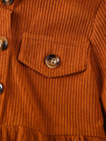 Close-up of a brown corduroy jacket with buttons and a pocket.