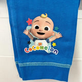 Blue towel with cartoon character and 'Cocomelon' logo on a tiled wall background