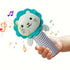 Toy lion with musical notes held by a hand on a white background