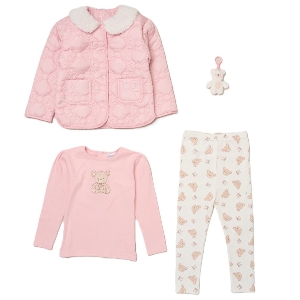 A three-piece baby girl's outfit set laid out on a white background, including a pink quilted jacket with a white faux-fur collar, a pink long-sleeve top with a teddy bear applique, and cream leggings with a beige teddy bear pattern. A small plush teddy bear toy is also included.