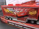 Toy truck with Lightning McQueen design on a red background