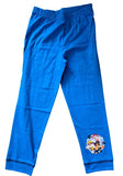 Blue children's pants with a cartoon character patch on a white background