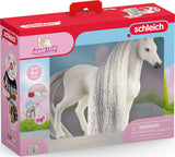 Schleich horse figure in packaging with visible branding and product details.